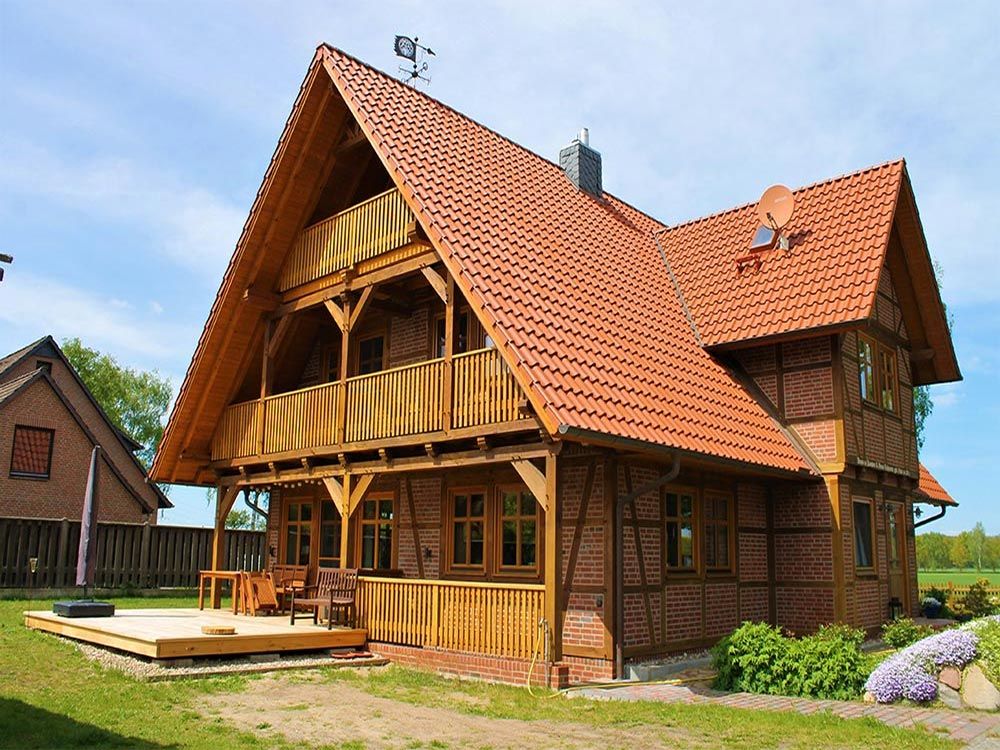 Neubau Fachwerkhaus mit Querbau | Zimmerei Holzbau Lühmann